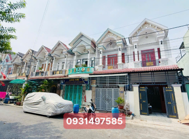 nhà chợ tân long dĩ an