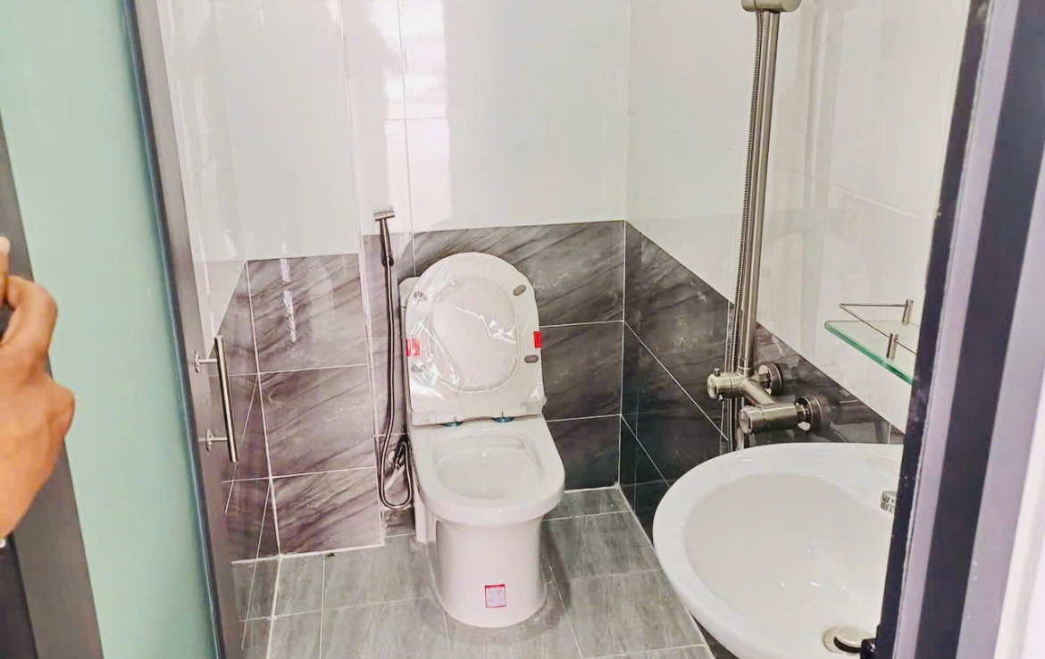 Nhà mặt tiền chợ thống nhất
