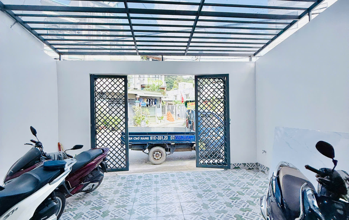 nhà mặt tiền gần chợ thống nhất dĩ an